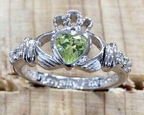 Closeup of August Birthstone Claddagh Ring